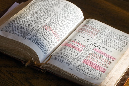 An open Bible with highlighted verses, symbolizing faith, wisdom, and spiritual guidance